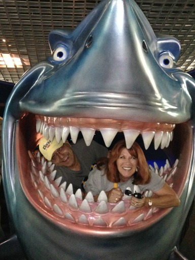 At Epcot, the smiles were contagious. (Dad, Mom, and Bruce the Shark)